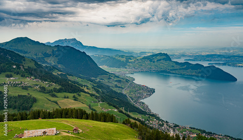 Switzerland, Panoramic view on green Alps and lake Lucerne, Beckenried village from Niederbauen.