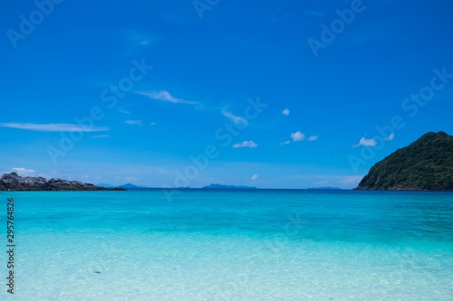 Beautiful blue sea contrast with clear sky © Phonpimon