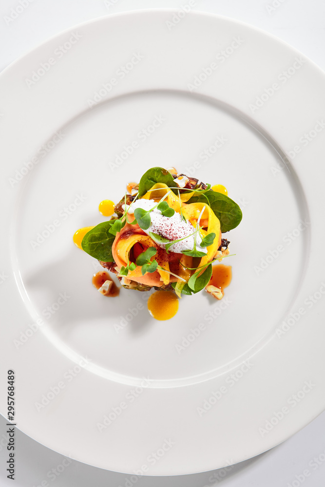 Exquisite serving avocado with mozzarella cream and dried tomato jam Exquisite serving avocado with mozzarella cream and dried tomato jam
