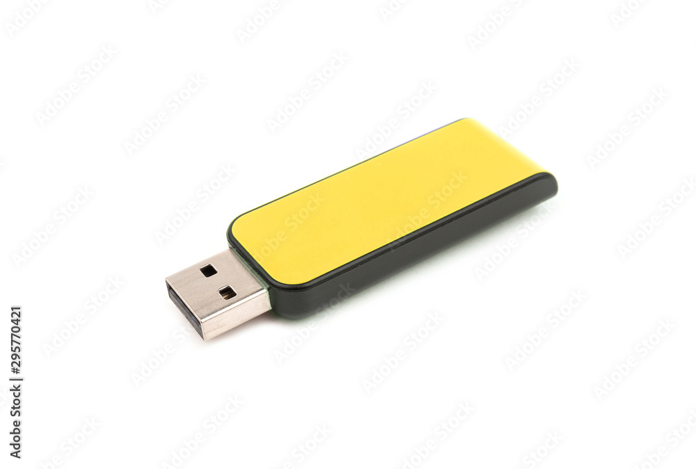 USB Yellow flash drive memory on a white background, selective focus USB Yellow flash drive memory on a white background, selective focus
