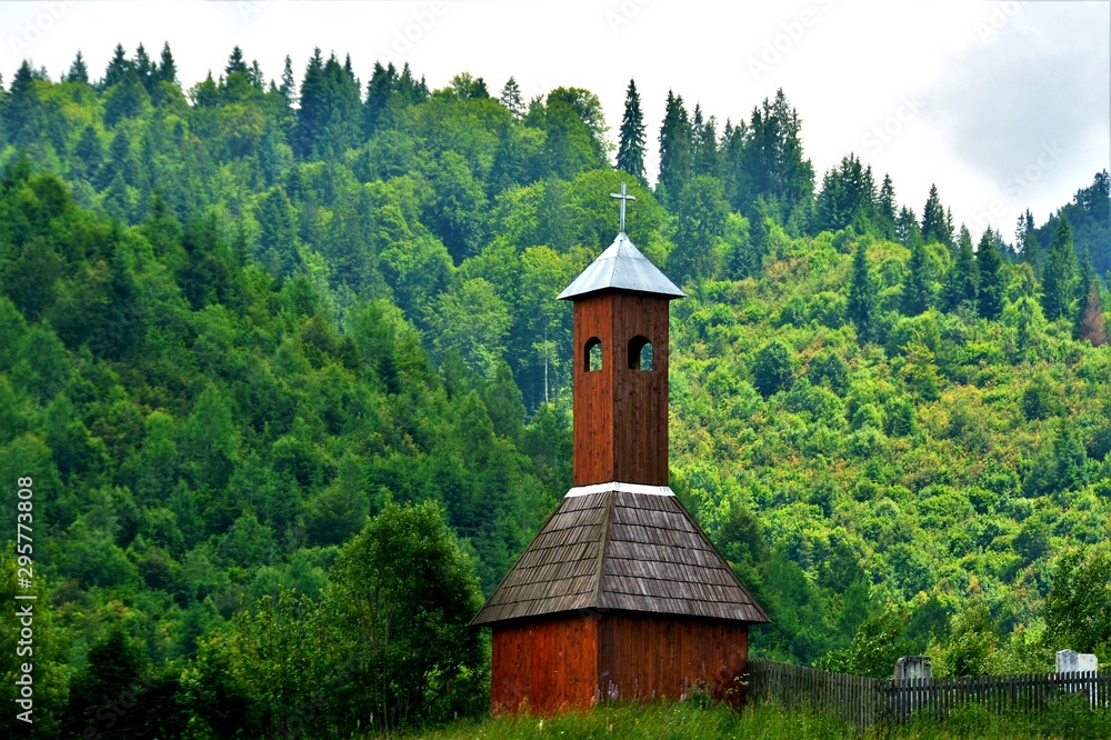 a small wooden church near the forest