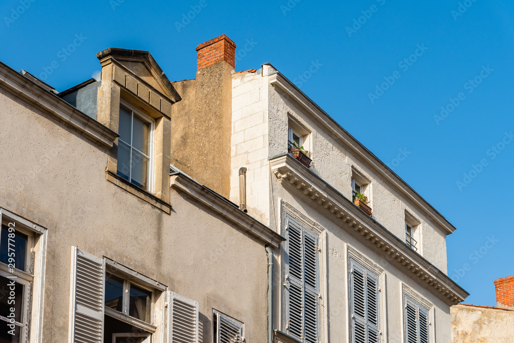 Decadent old residential buildings in the historic centre of La Rochelle, France