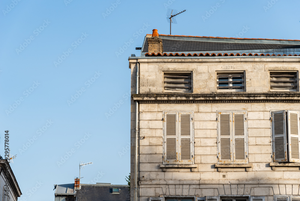 Decadent old residential buildings in the historic centre of La Rochelle, France Decadent old residential buildings in the historic centre of La Rochelle, France