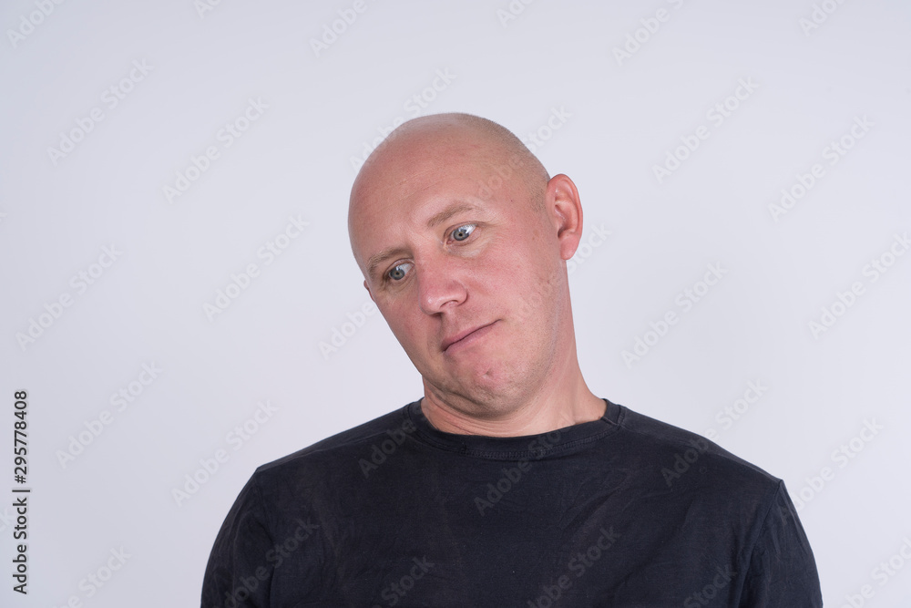 Portrait of middle-aged caucasian bald man , close up Portrait of middle-aged caucasian bald man , close up