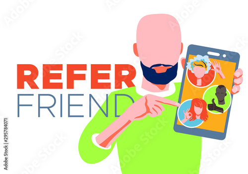 Refer a friend referral program concept. Bearded bald man holding smartphone and shows to his friends people as avatar. Character invites acquaintances to marketing promotion, sharing refer code photo