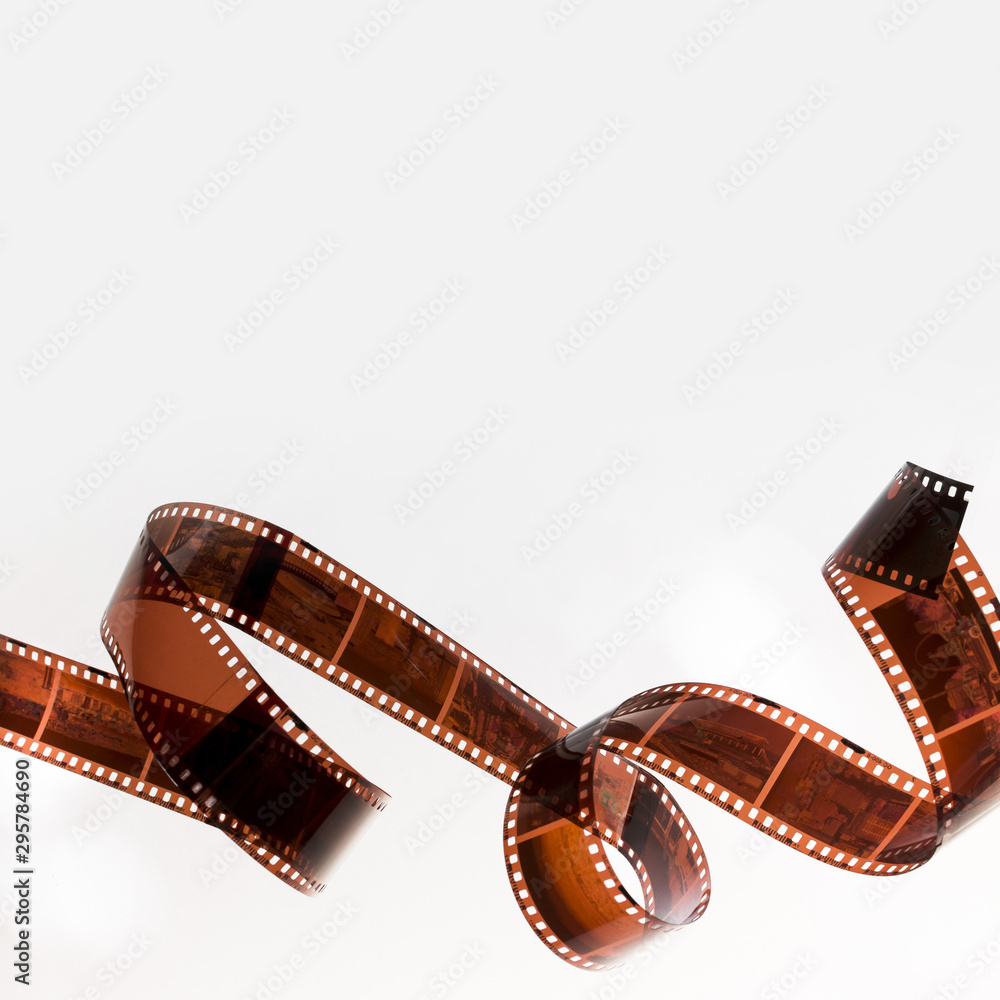 Curled filmstrip isolated on white background