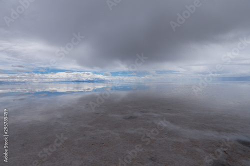 The Salar de Uyuni flooded after the rains, Bolivia. Clouds reflected in the water of the Salar de Uyuni, Bolivia © Marco Ramerini
