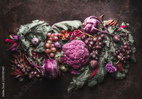 Fototapeta Naklejka Na Ścianę i Meble -  Purple fruits and vegetables setting. Anthocyanins health benefits as dietary antioxidants. Top view. Flat lay.