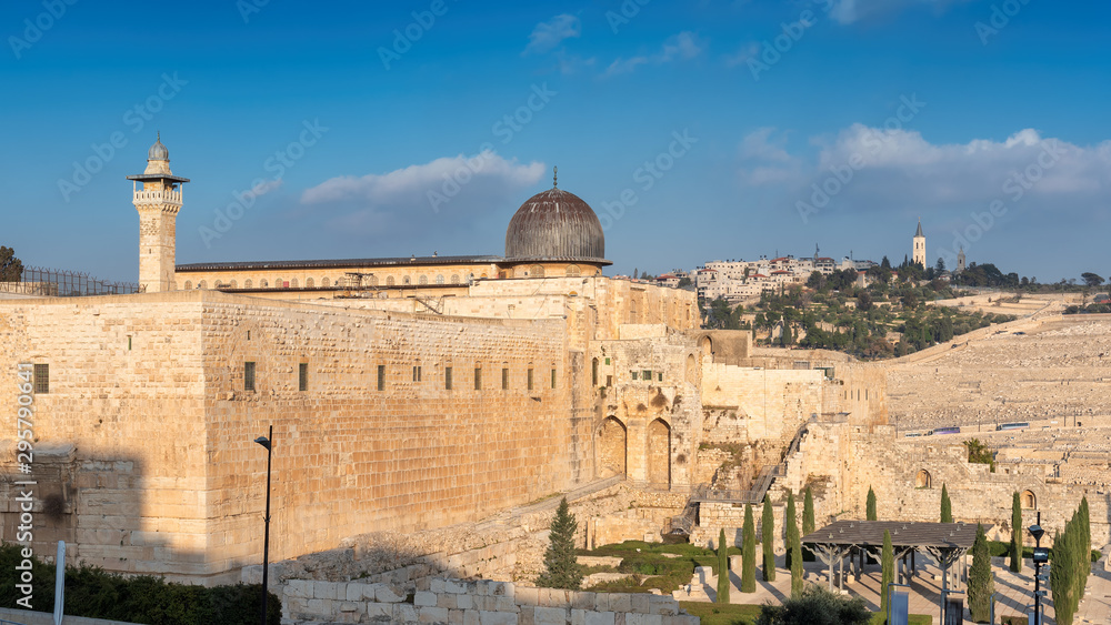Jerusalem Old City at sunset, Al-Aqsa Mosque and the Mount of Olives iIsrael.