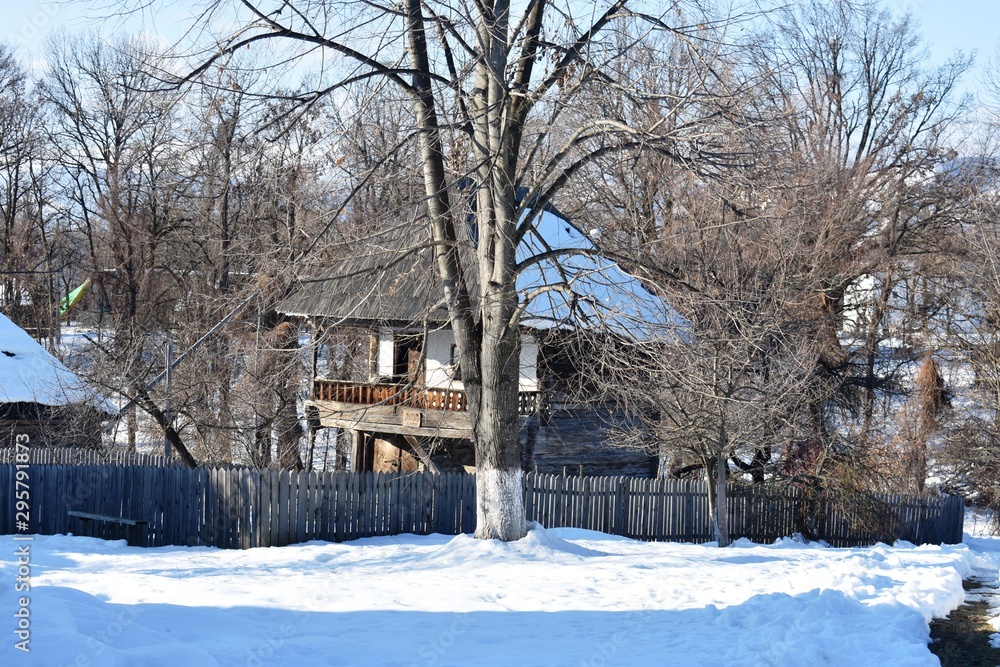 Wooden house in winter landscape in Romania Wooden house in winter landscape in Romania