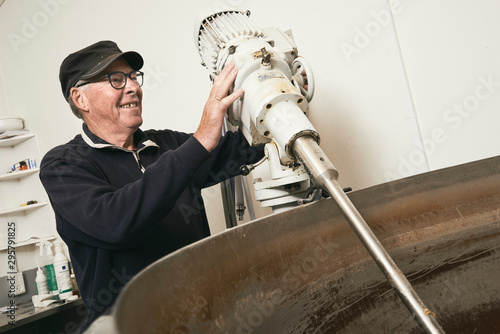 Fotografie Man working at a distillery