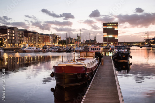  Antwerpen, Belgium, beautiful night view of modern Eilandje area and port. Small island district and sailing marine at sunset. Popular travel destination and tourist attraction photo