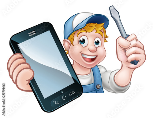 An electrician or handyman holding a screwdriver and phone with copyspace