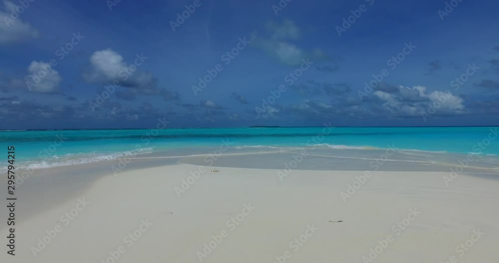 wide shot taken at a lovely beach with a shallow water on beautiful white sandy island - Paradise wide shot taken at a lovely beach with a shallow water on beautiful white sandy island - Paradise