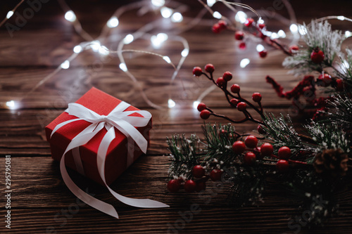 Christmas presents on dark wooden background in vintage style