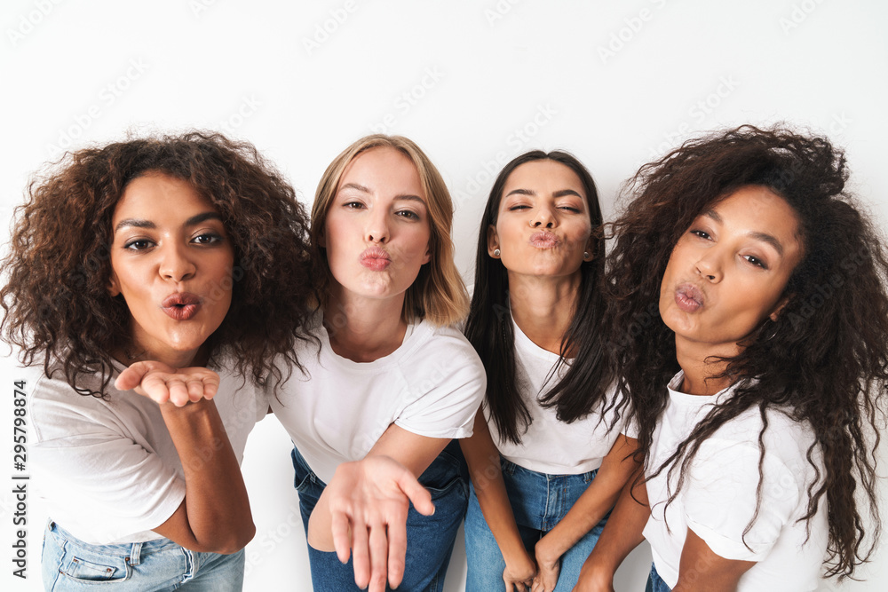 Women multiracial friends blowing kisses to you. - obrazy, fototapety, plakaty 