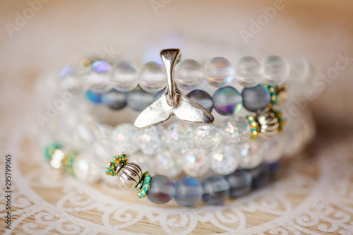 Metal whale tale pendant on...