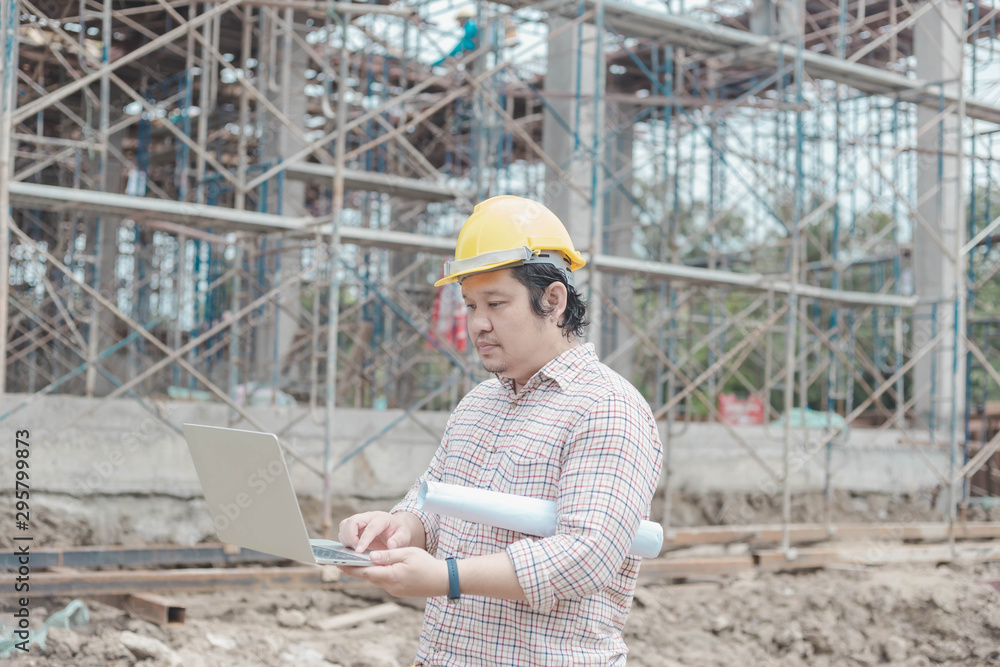 Engineer working on site, inspecting hands, using laptop site, construction concept, background construction concept Engineer working on site, inspecting hands, using laptop site, construction concept, background construction concept