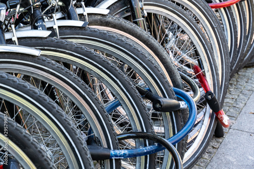 Line of bike wheels and rims locked with deadlock