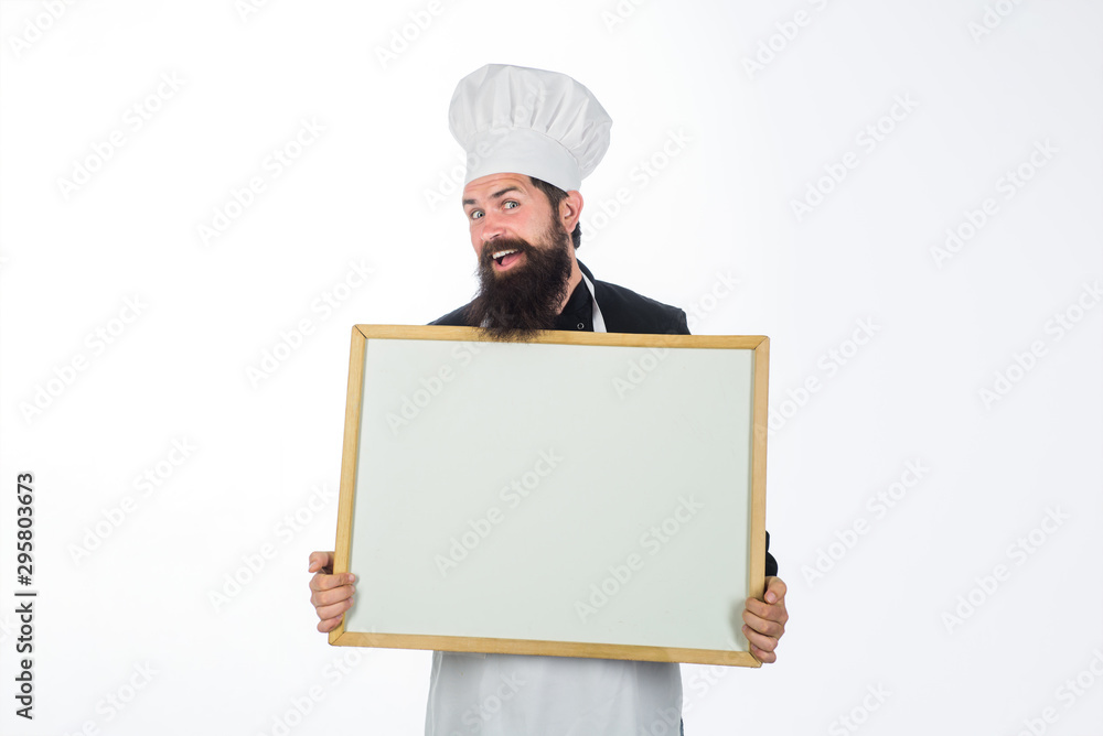 Advertising chef menu. Business lunch menu. Bearded chef holds blackboard. Restaurant chef show empty chalkboard. Blank chalkboard with copy space for text. Male chef, cook or baker with blank board. Advertising chef menu. Business lunch menu. Bearded chef holds blackboard. Restaurant chef show empty chalkboard. Blank chalkboard with copy space for text. Male chef, cook or baker with blank board.