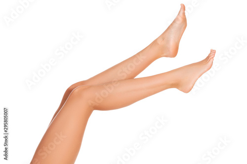 Long beautiful woman legs, isolated on white background