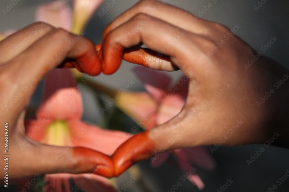 picture of the hand after applied of Natural / herbal or home made henna with some traditional henna design or model picture of the hand after applied of Natural / herbal or home made henna with some traditional henna design or model