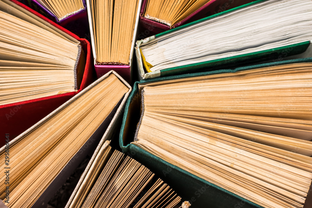 Obraz premium Several old worn hardback books