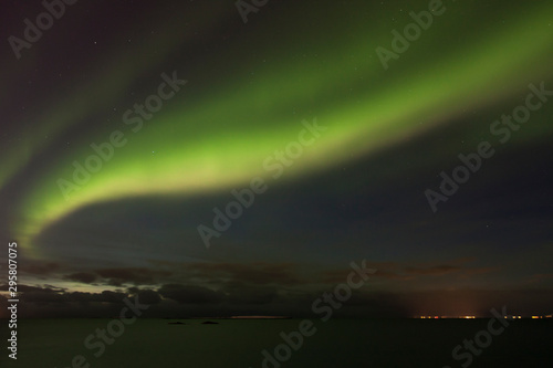 Beautiful northern lights over the Atlantic ocean. Iceland