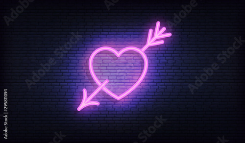 Heart with arrow neon sign. Glowing purple heart signboard design