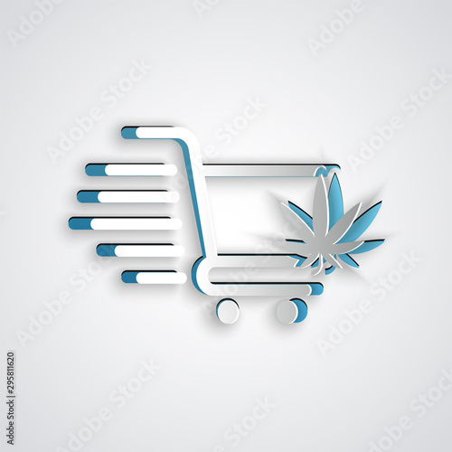 Paper cut Shopping cart with marijuana or cannabis leaf icon isolated on grey background. Online buying. Delivery service. Supermarket basket. Paper art style. Vector Illustration