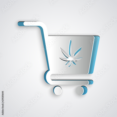 Paper cut Shopping cart with marijuana or cannabis leaf icon isolated on grey background. Online buying. Delivery service. Supermarket basket. Paper art style. Vector Illustration