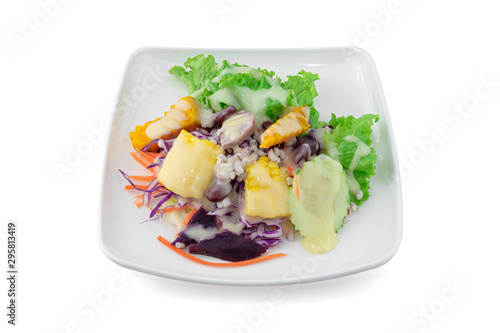 Fresh vegetables Salad with toping dressing isolated on white background with clipping path