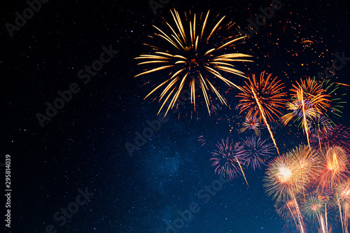Obraz na płótnie Fireworks with blur milky way background