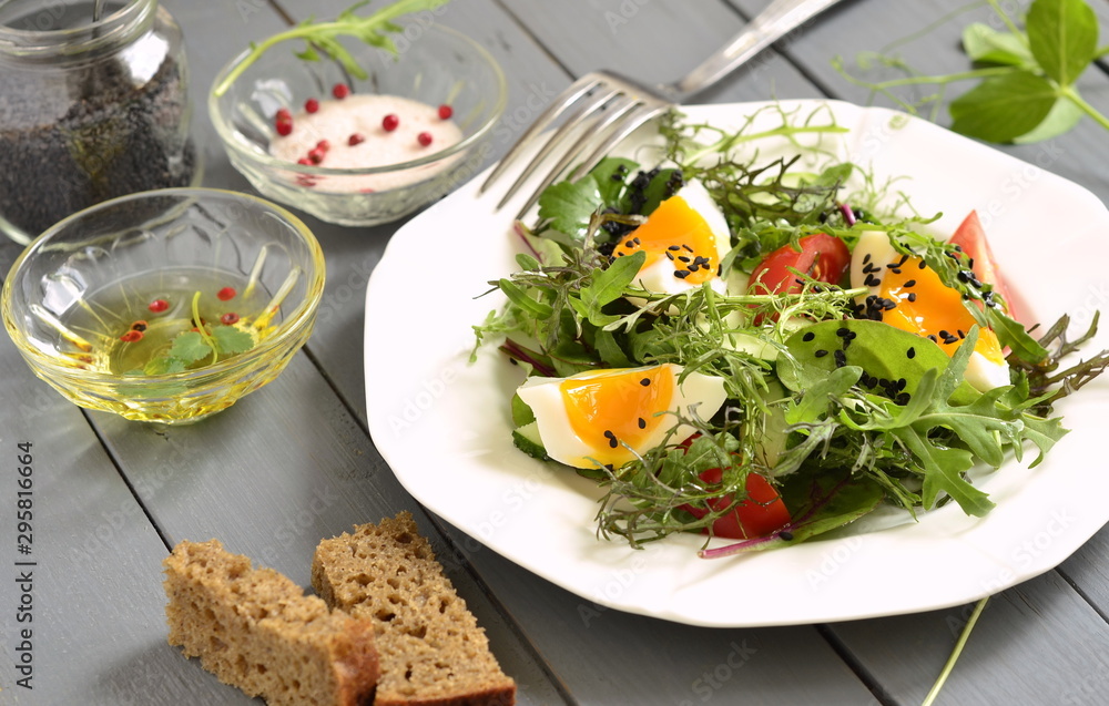 Cucumber, tomato, egg, fresh green salad with black sesame Cucumber, tomato, egg, fresh green salad with black sesame