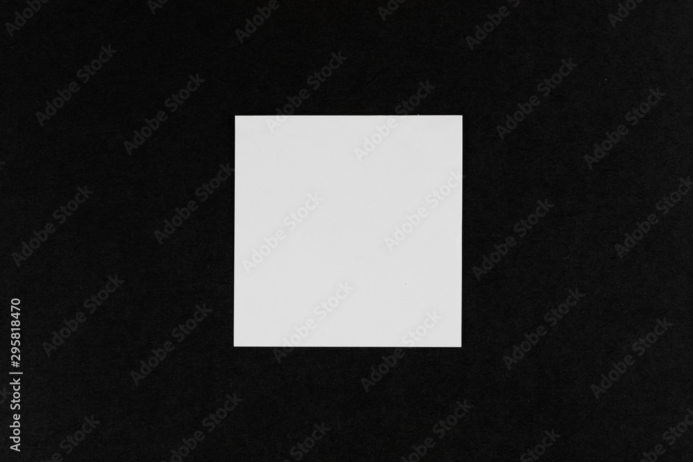 The white paper note put on black board. The white paper note put on black board.
