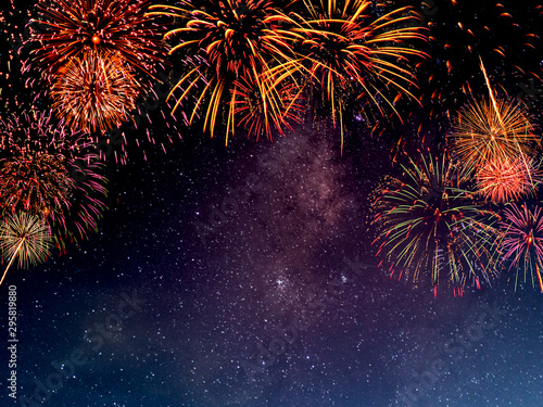 Fireworks with blur milky way background photo