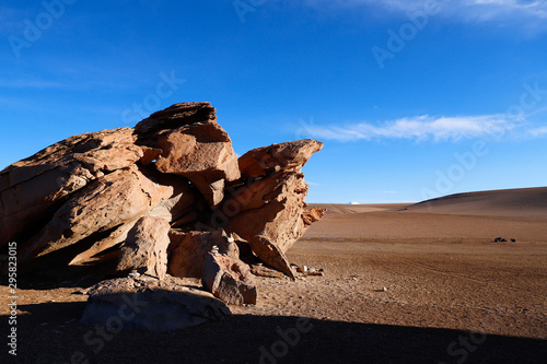 Rock formations in the Siloli Desert. Snow-capped volcanoes and desert landscapes in the highlands of Bolivia. Andean landscapes of the Bolivia Plateau