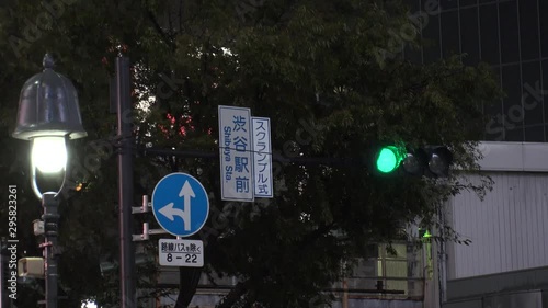 TOKYO,JAPAN - 12 OCTOBER 2019 : Powerful Typhoon Hagibis made landfall. Heaviest rain and winds in 60 years. Government issued highest level of disaster warning. View around Shibuya scramble crossing. photo