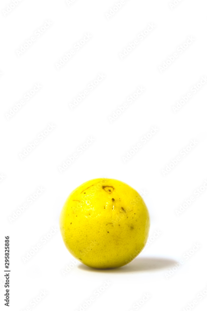 closeup of ugly lemon on white background closeup of ugly lemon on white background
