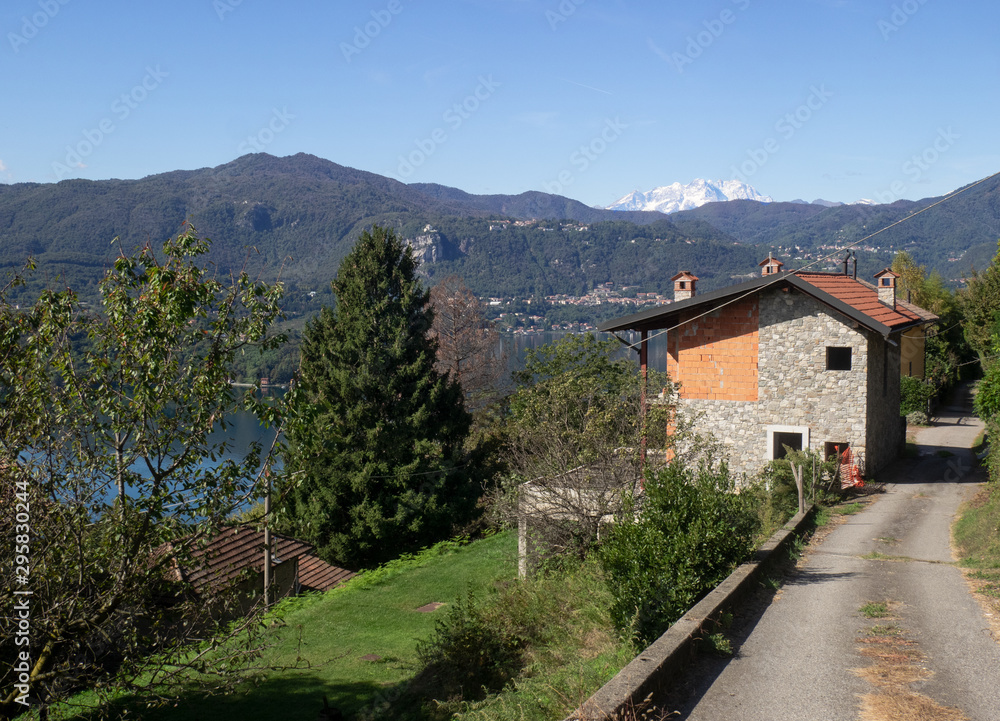 mountain house under construction with a splendid view of the lake below.Piedmont - Italy