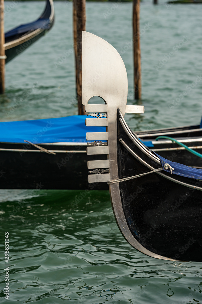Venice, detail of a prow of gondola, typical Venetian rowboat, Canal Grande, UNESCO world heritage site, Veneto, italy, Europe