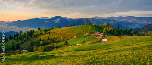 Beautiful landscape mountain hill meadow sunrise morning village Bucovina Romania  © Cristi
