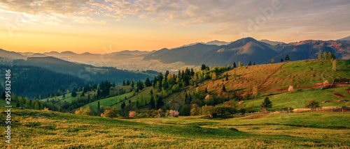 Beautiful landscape mountain hill meadow sunrise morning village Bucovina Romania © Cristi
