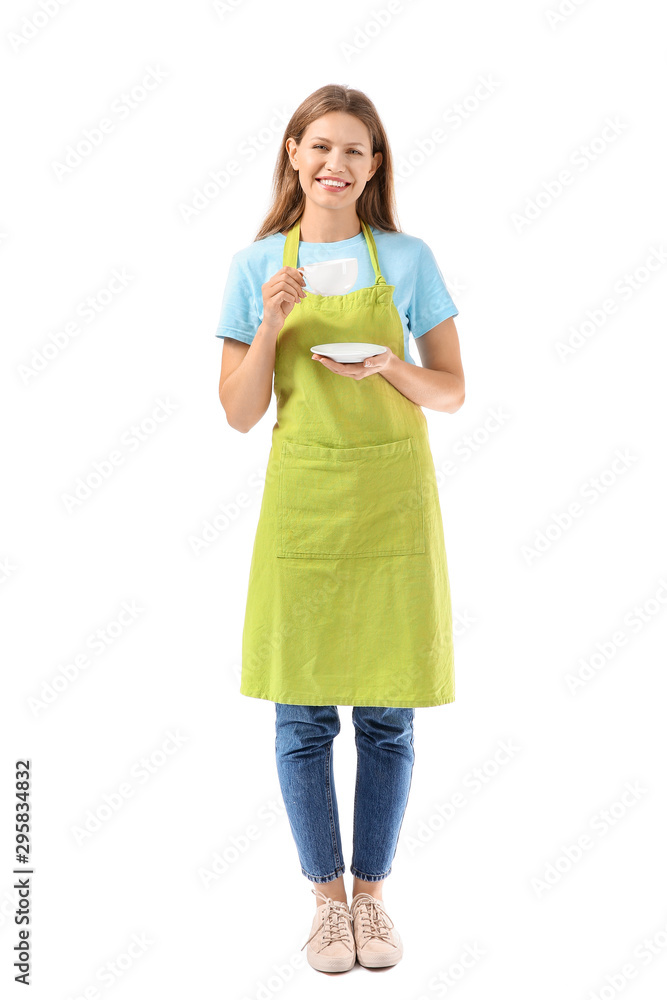 Beautiful young woman in apron and with cup of coffee on white background Beautiful young woman in apron and with cup of coffee on white background
