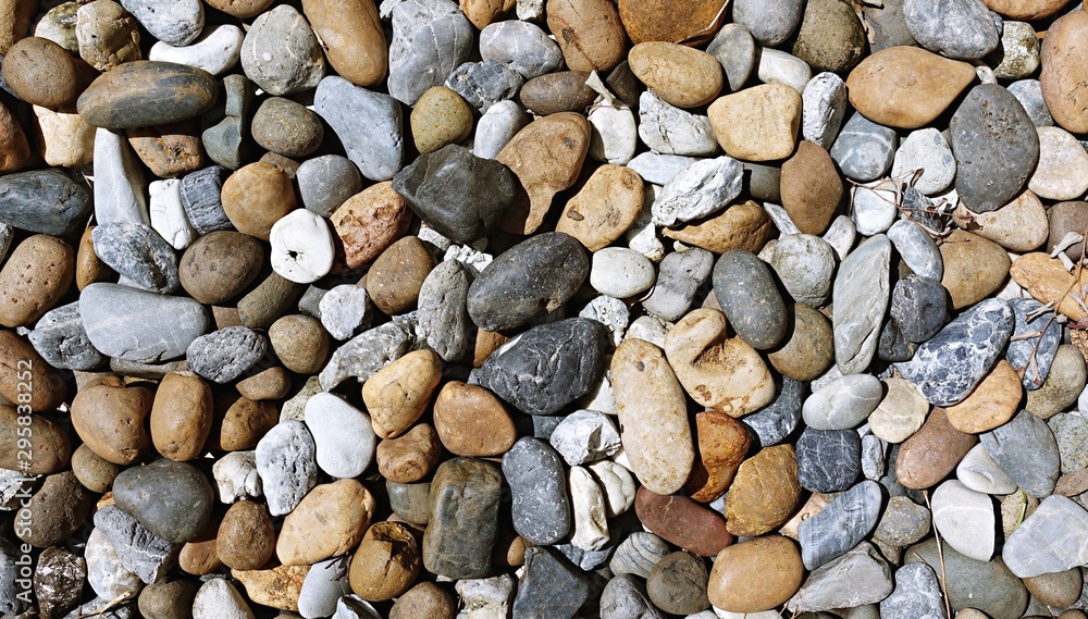 Pebble on the ground in nature, pebble background, a rock Pebble on the ground in nature, pebble background, a rock
