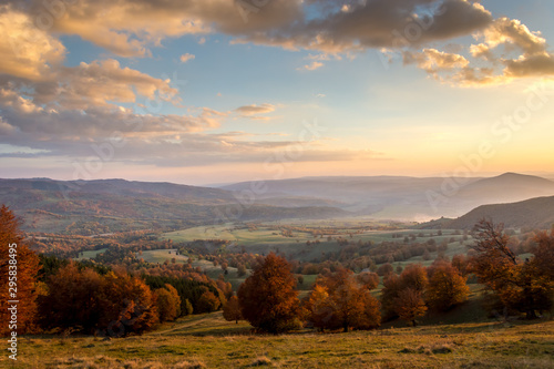 Beautiful landscape mountain hill meadow sunrise morning village Romania  © Cristi