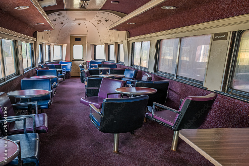 Tables and Chairs in the Bar Car on an Antique Train Tables and Chairs in the Bar Car on an Antique Train