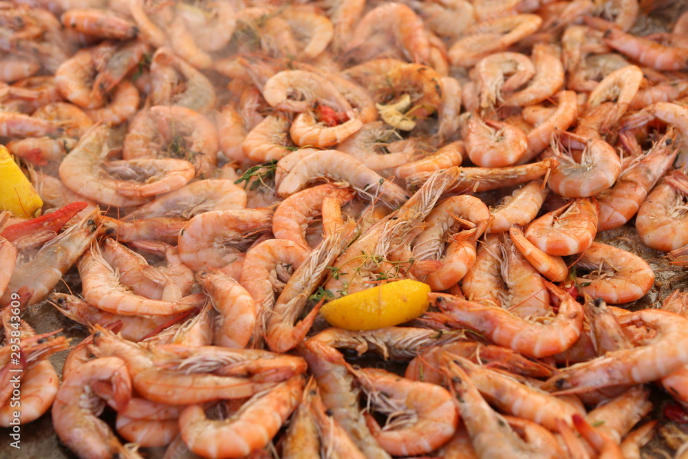 Shrimps background texture. A lot of sea shrimp. Sea food. Cooked shrimps. Copy space Shrimps background texture. A lot of sea shrimp. Sea food. Cooked shrimps. Copy space