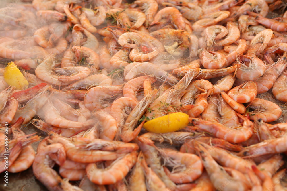 Shrimps background texture. A lot of sea shrimp. Sea food. Cooked shrimps. Copy space