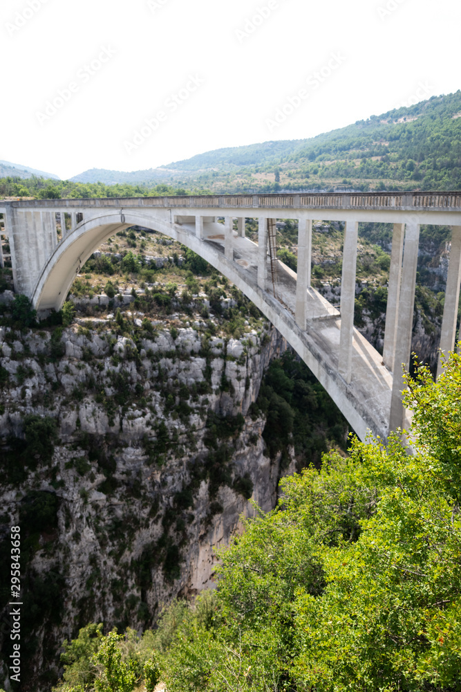 Fototapeta premium Mountain canyon and bridge in France. Verdon